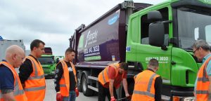 Simply Waste Solutions staff in vehicle training session