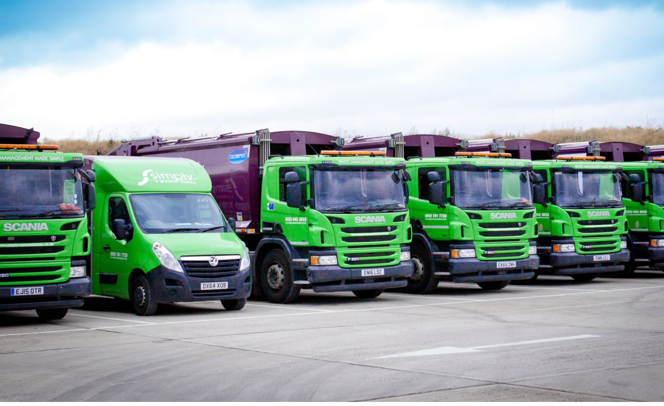 Simply Waste Solutions trucks and van lined up
