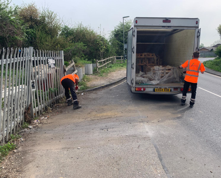 Simply Waste Solutions driver and loader clearing fly tipped waste