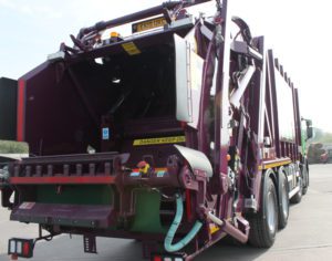 back of Simply Waste Solutions 2019 plate rear end loader (rel) truck