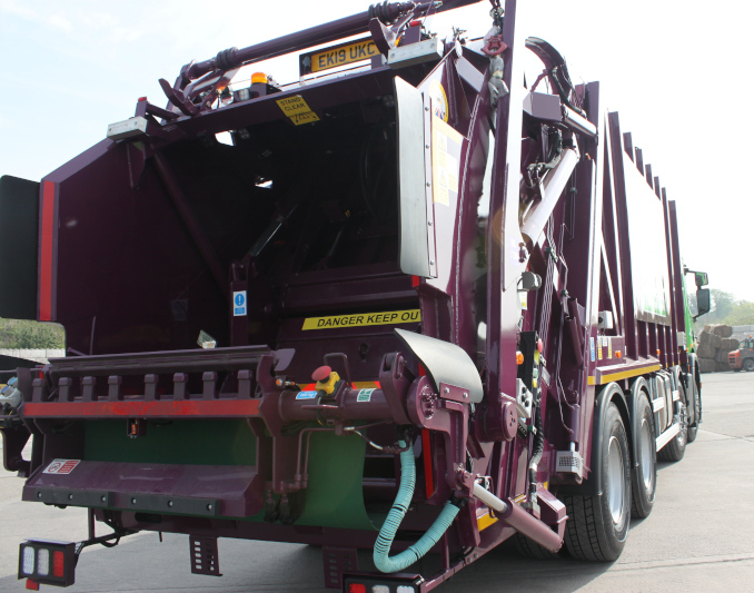 back of Simply Waste Solutions 2019 plate rear end loader (rel) truck