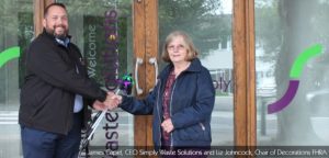 Newsletter image. Flackwell Heath Litterpick. James Capel, CEO of Simply Waste Solutions handing over litterpick to Liz Johncock