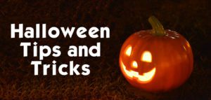 Halloween recycling tips and tricks text next to candle lit, carved pumpkin on field of grass