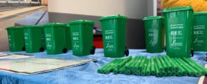 Recycling Roadshow at Banbury Station. Simply Waste Solutions merchandise of pencils and wheelie bins placed on table.
