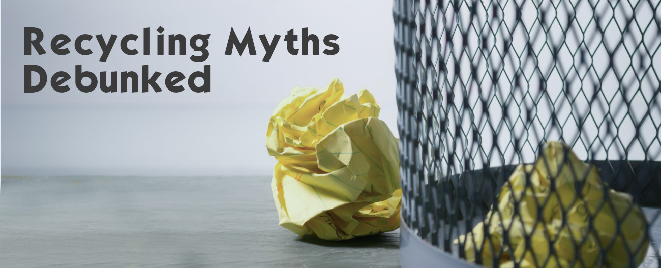 Debunking Recycling Myths. Paper next to waste bin