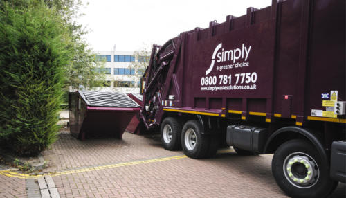Rear End Loader (REL) containers having waste collected by Simply Waste Solutions truck